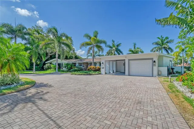 a view of a dining room with furniture and a livingroom