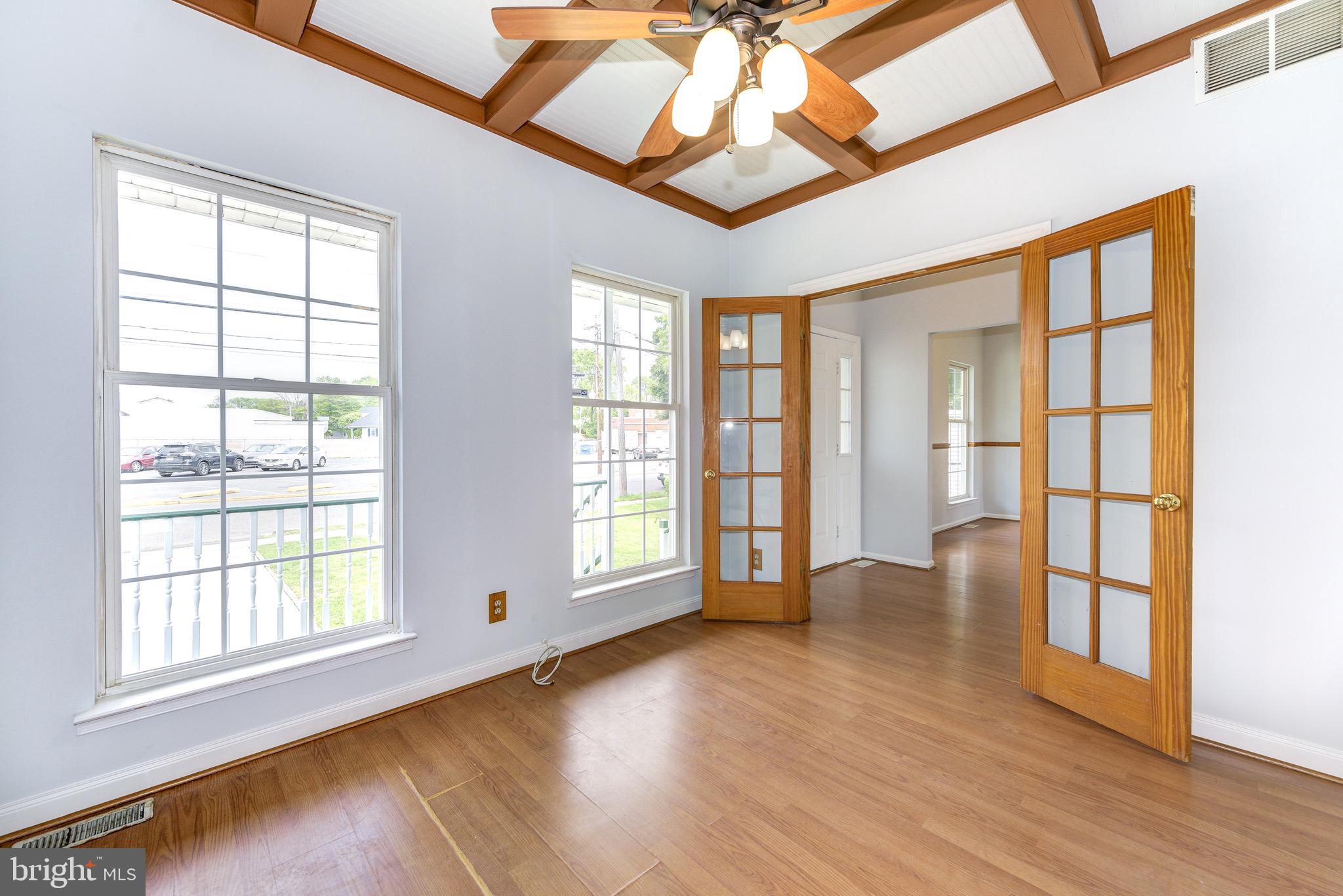 22 South Maple Avenue Maple Shade, NJ 08052 - Photo 4 of 30 Beamed Ceilings and Double Glass Panel Doors