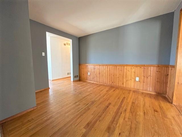 188 Waynesburg Road Washington, PA 15301 - Photo 7 of 17 a view of wooden floor and windows in a room