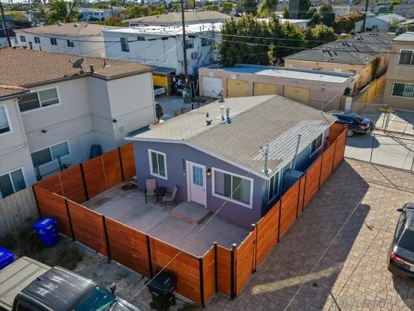 an aerial view of a house with sitting space