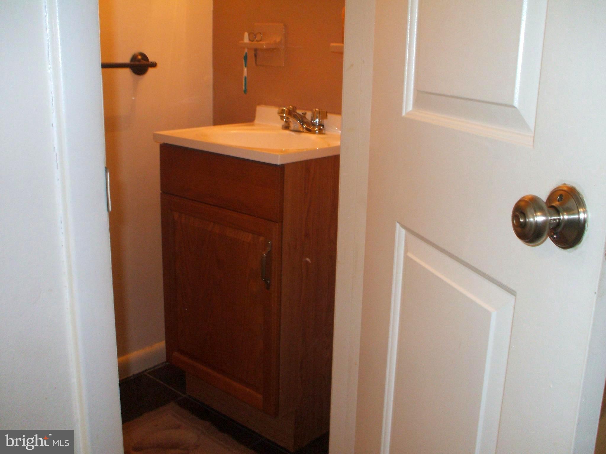 1328 Adair Road Brookhaven, PA 19015 - Photo 13 of 30 Remodeled Main Level Powder Room