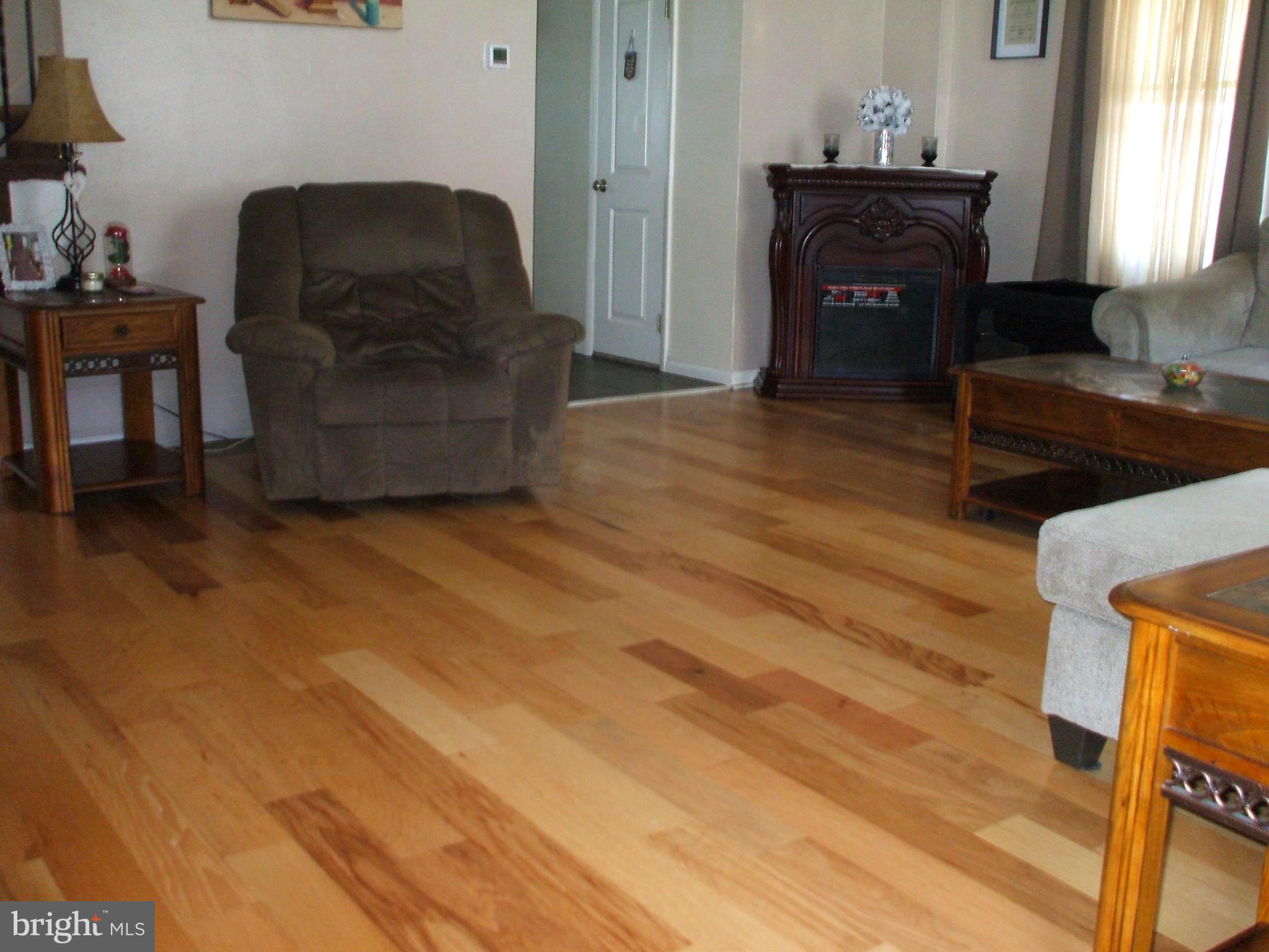 1328 Adair Road Brookhaven, PA 19015 - Photo 5 of 30 Large Living Room W/Hardwood Floors & Ceiling Fan