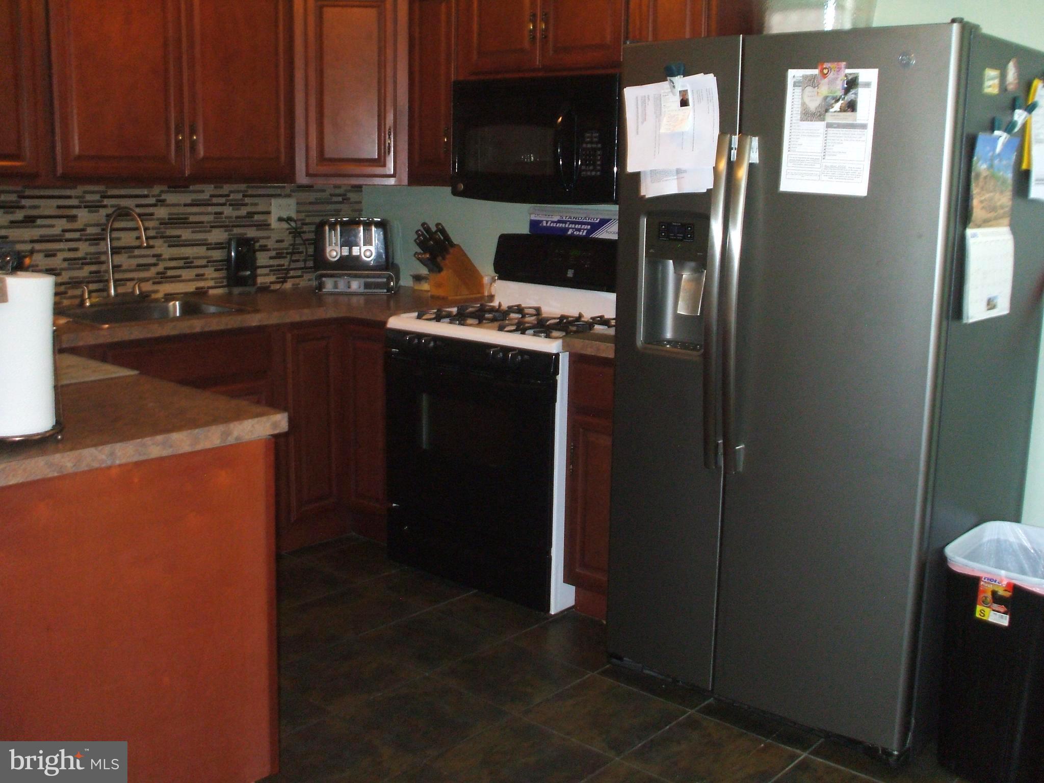 1328 Adair Road Brookhaven, PA 19015 - Photo 7 of 30 Remodeled Kitchen - Cherry Cabinets & Cer. Tile Fl
