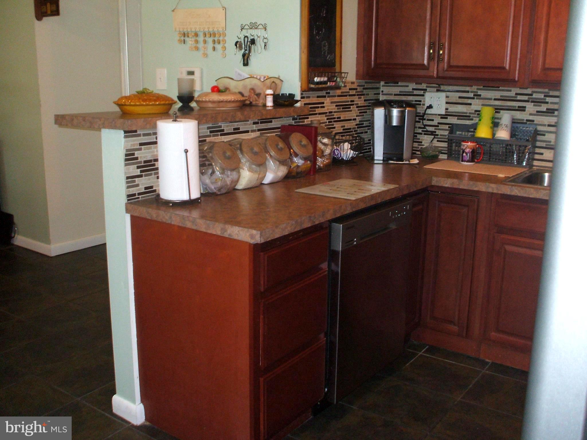 1328 Adair Road Brookhaven, PA 19015 - Photo 8 of 30 Remodeled Kitchen w/Tile Backsplash