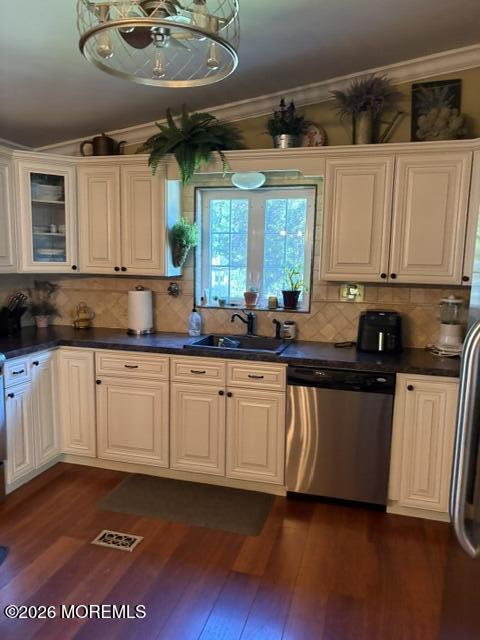 39 Hibiscus Place, Unit A Jackson, NJ 08527 - Photo 8 of 39 a kitchen with stainless steel appliances granite countertop a sink a stove a microwave a counter space and cabinets