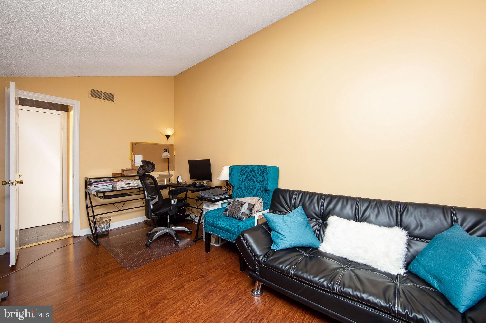 2114 Sandra Road Voorhees, NJ 08043 - Photo 17 of 26 a living room with furniture and a wooden floor