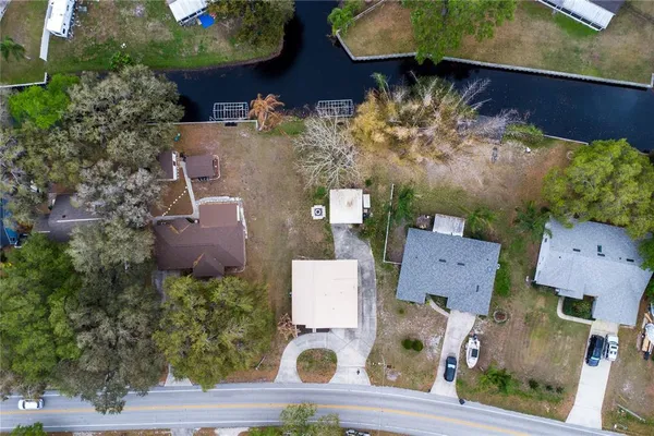 an aerial view of residential house with outdoor space