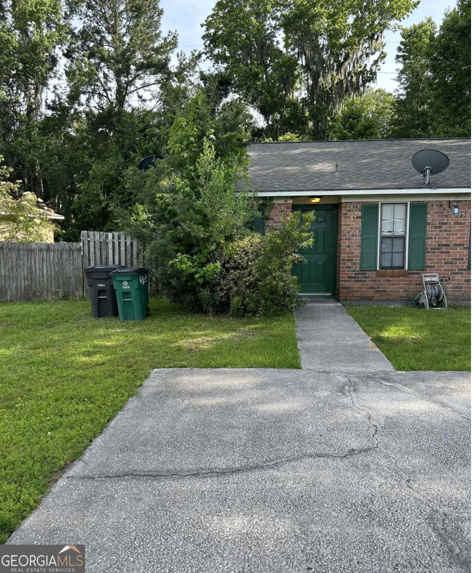 406 Admiral's Walk Drive St. Marys, GA 31558 - Photo 1 of 7 a view of backyard with green space