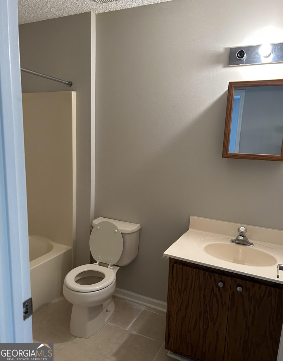 406 Admiral's Walk Drive St. Marys, GA 31558 - Photo 6 of 7 a bathroom with a sink mirror vanity and toilet