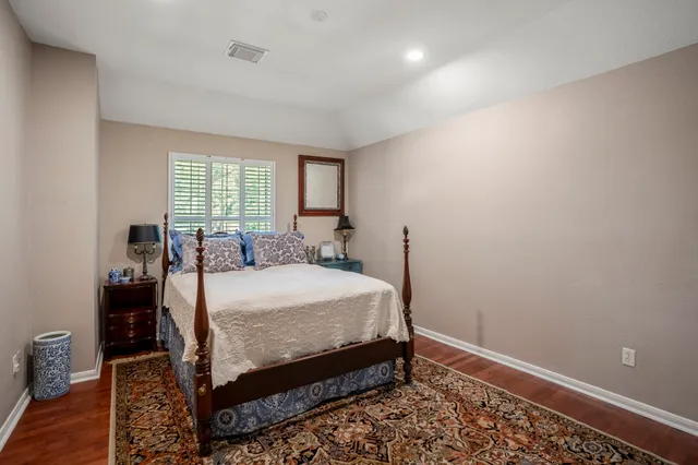 a view of outdoor space with playground and green space