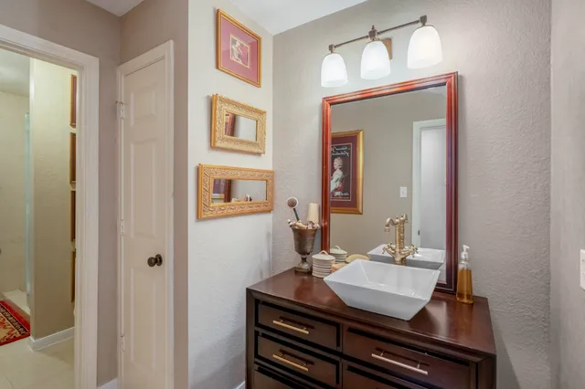 a living room with furniture and a rug