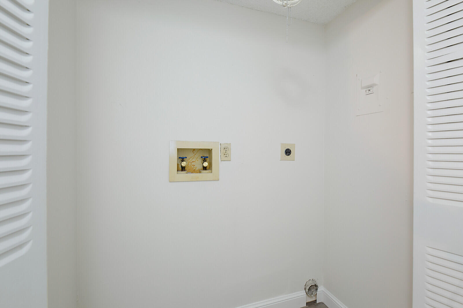 9335 Flynn Circle, Unit 1 Boca Raton, FL 33496 - Photo 23 of 32 Laundry Closet