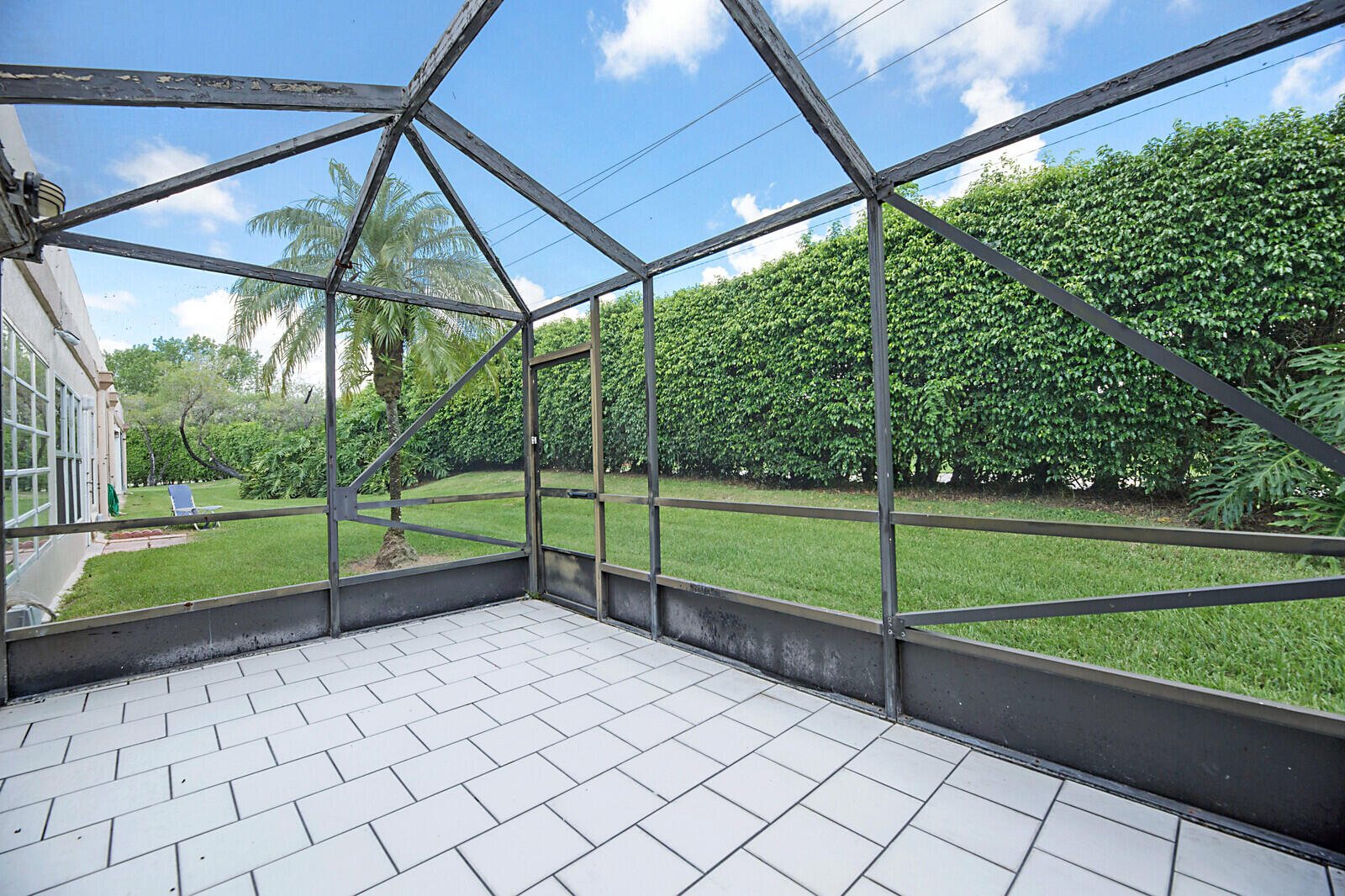 9335 Flynn Circle, Unit 1 Boca Raton, FL 33496 - Photo 24 of 32 Screened Patio