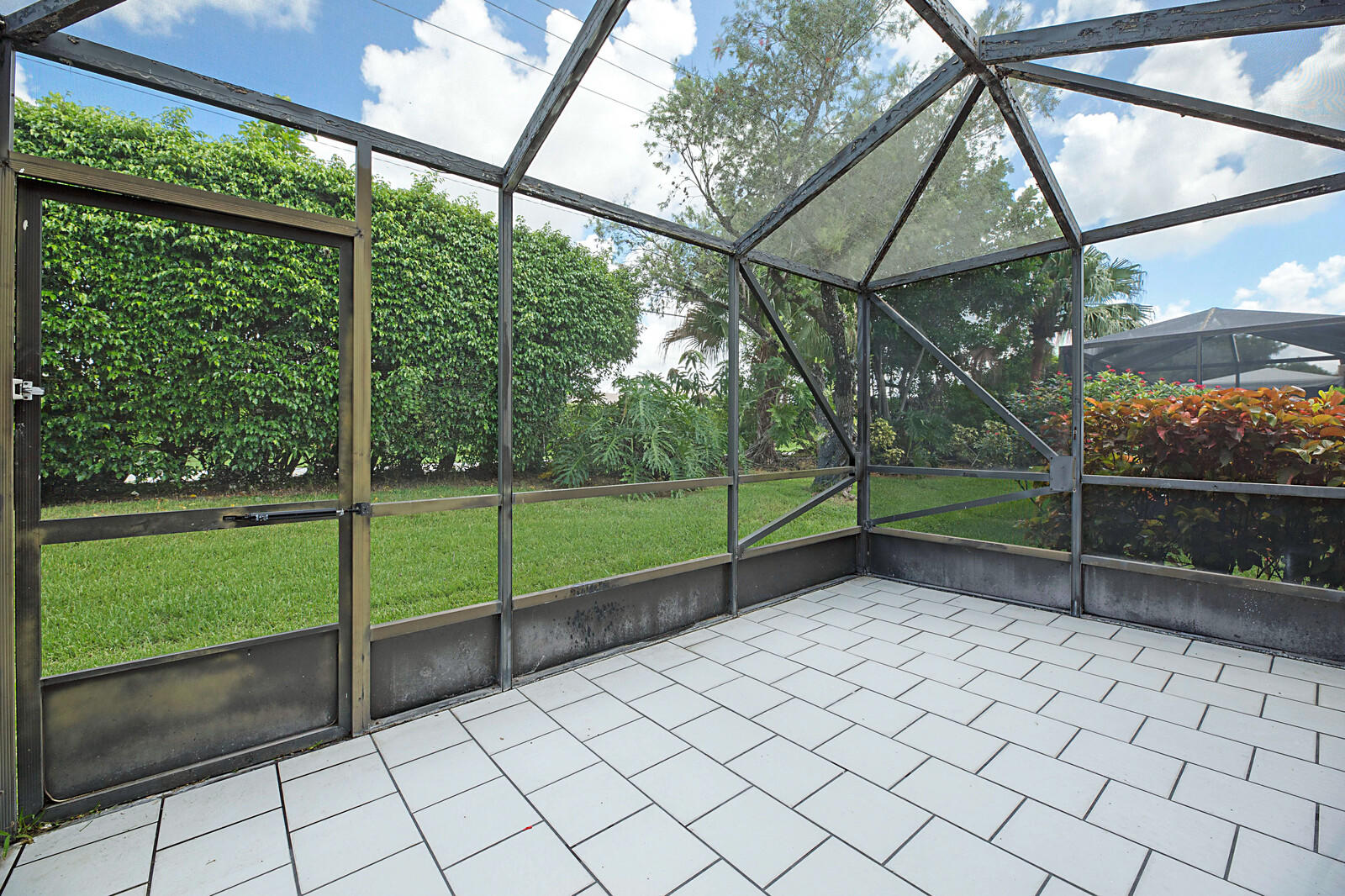9335 Flynn Circle, Unit 1 Boca Raton, FL 33496 - Photo 25 of 32 Screened Patio