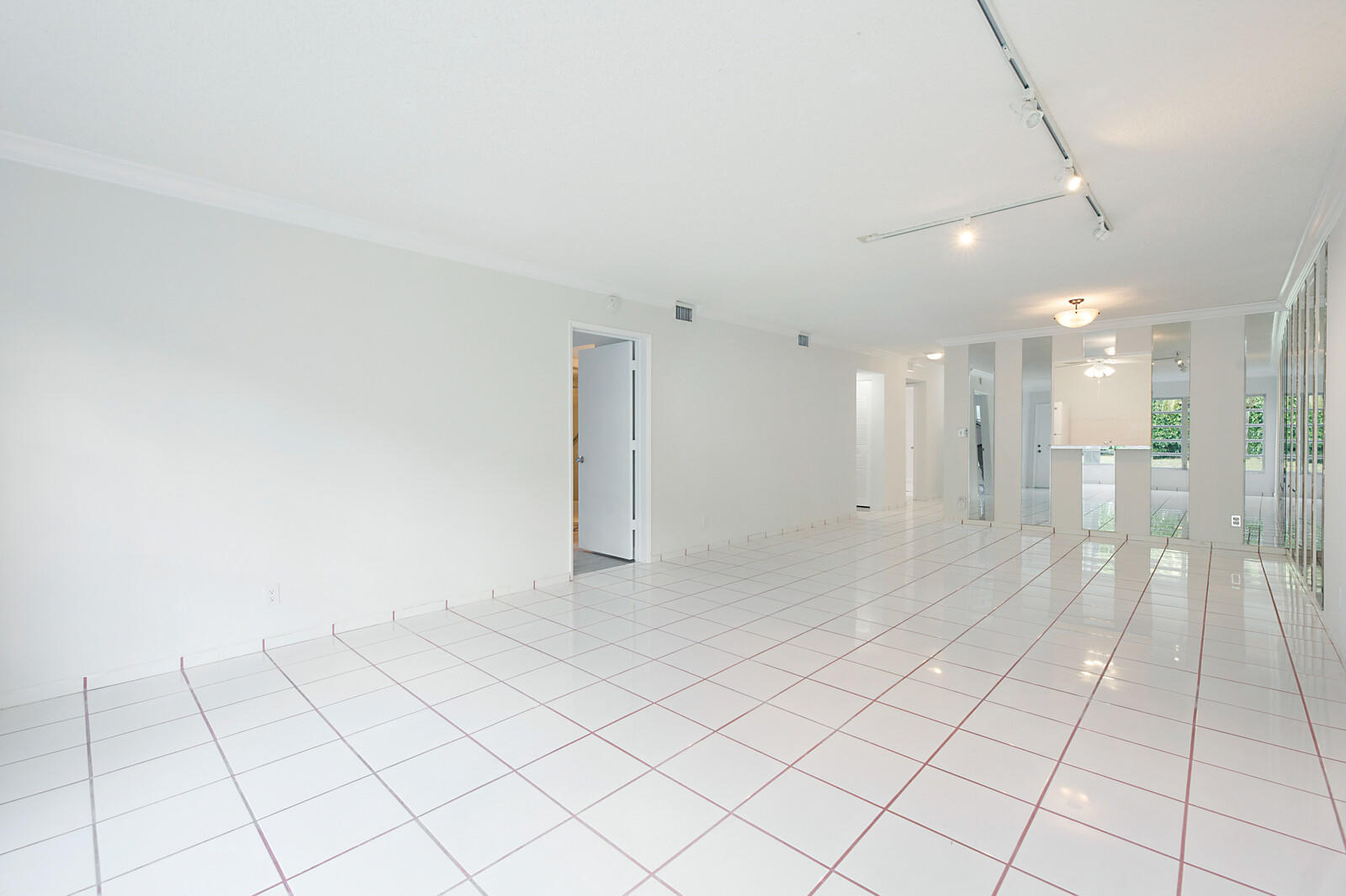 9335 Flynn Circle, Unit 1 Boca Raton, FL 33496 - Photo 8 of 32 Living/Dining Room