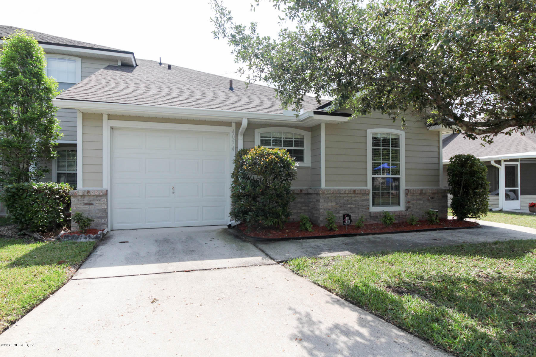 405 North Steel Bridge Road St. Johns, FL 32259 - Photo 1 of 29 front view of a house with a yard