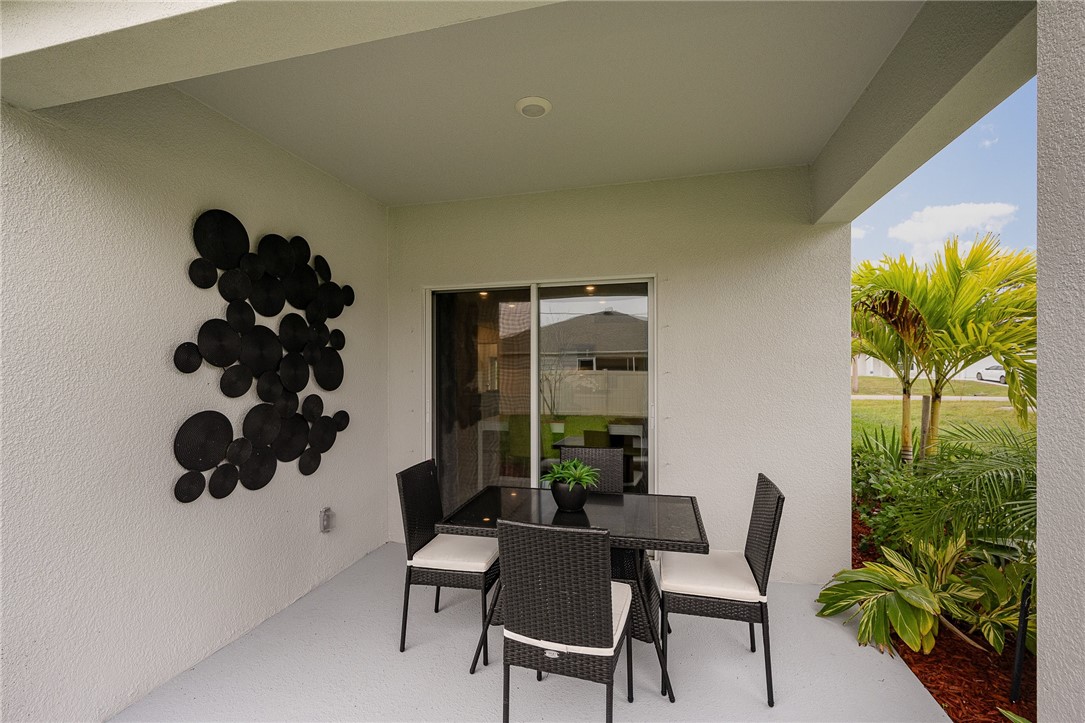 929 Devon Avenue Sebastian, FL 32958 - Photo 25 of 33 a dining room with furniture and a large window