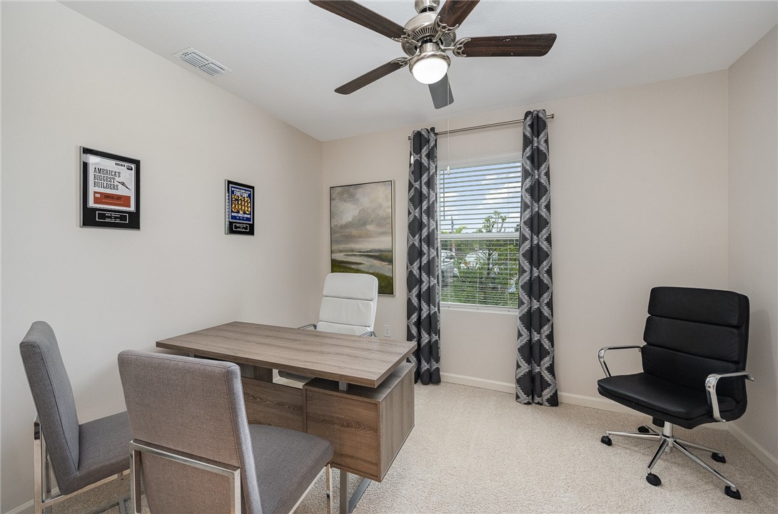 929 Devon Avenue Sebastian, FL 32958 - Photo 4 of 33 a workspace with furniture and a window
