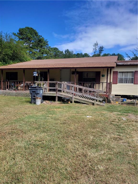 543 Poole Bridge Road Hiram, GA 30141 - Photo 1 of 1 a front view of a house with garden