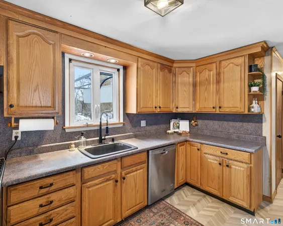 a kitchen with a sink and cabinets