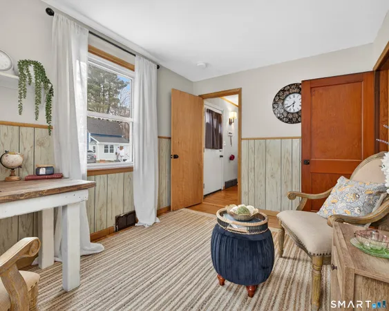 a view of a dining room with furniture window and outside view