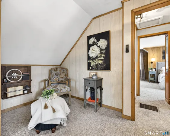 a spacious bedroom with a large bed and a window