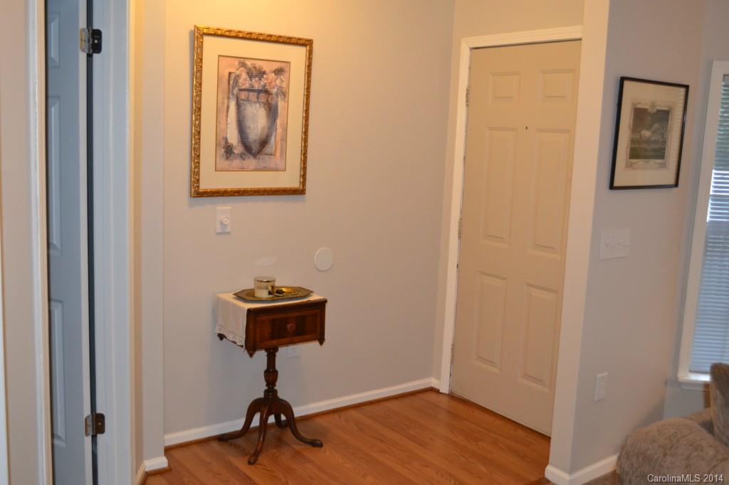 774 Sunderland Road Southwest Concord, NC 28027 - Photo 2 of 12 a view of a hallway with workspace