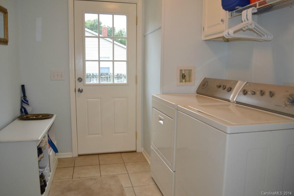 774 Sunderland Road Southwest Concord, NC 28027 - Photo 11 of 12 a utility room with dryer and washer