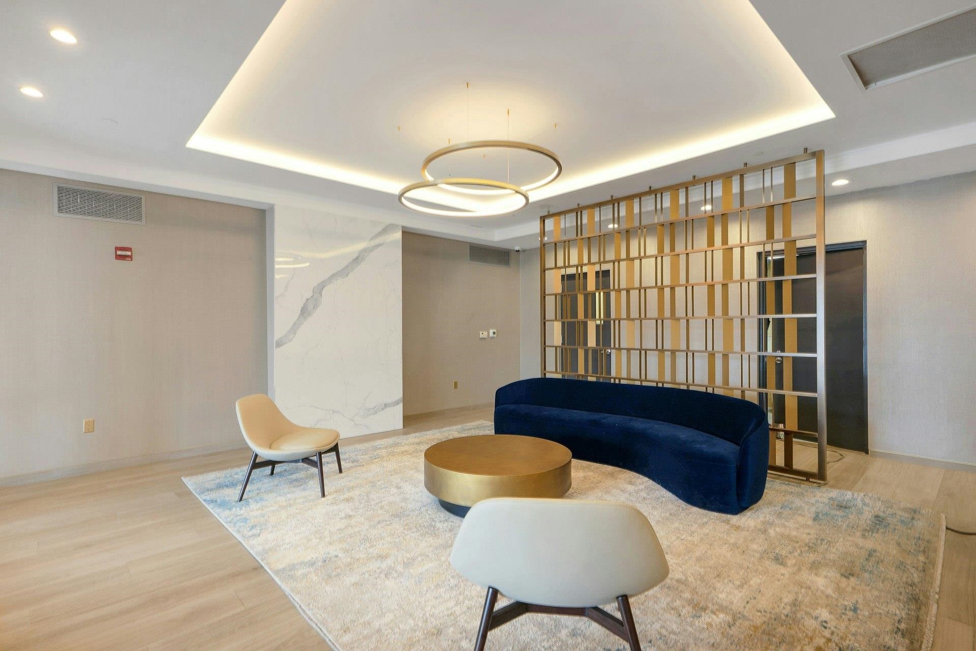 700 Grove Street, Unit 12P Jersey City, NJ 07310 - Photo 6 of 7 a living room with furniture and a large window