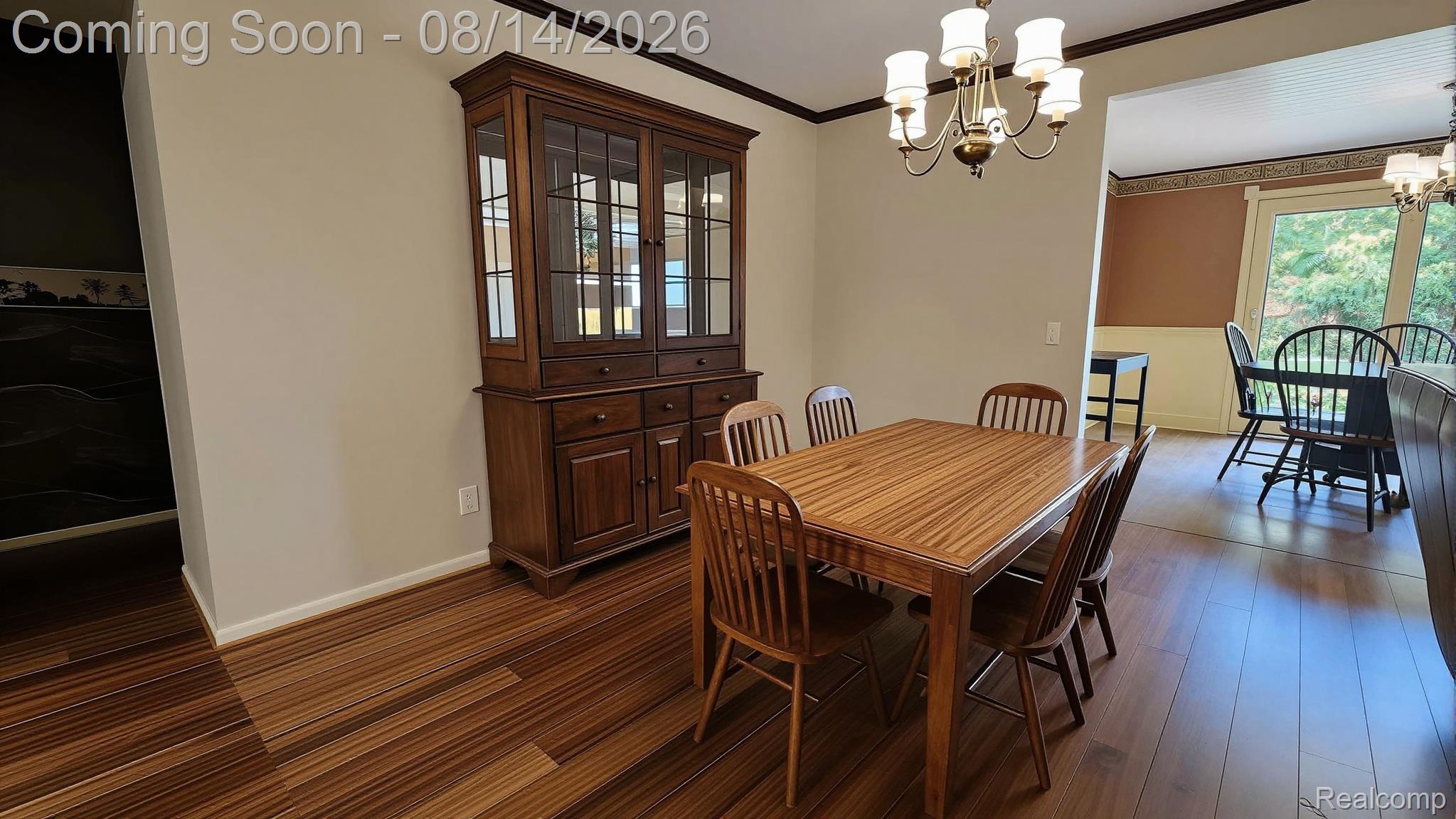 7966 Pettysville Road Pinckney, MI 48169 - Photo 17 of 43 Wood-finish flooring throughout, framed opening, and a built-in display cabinet
