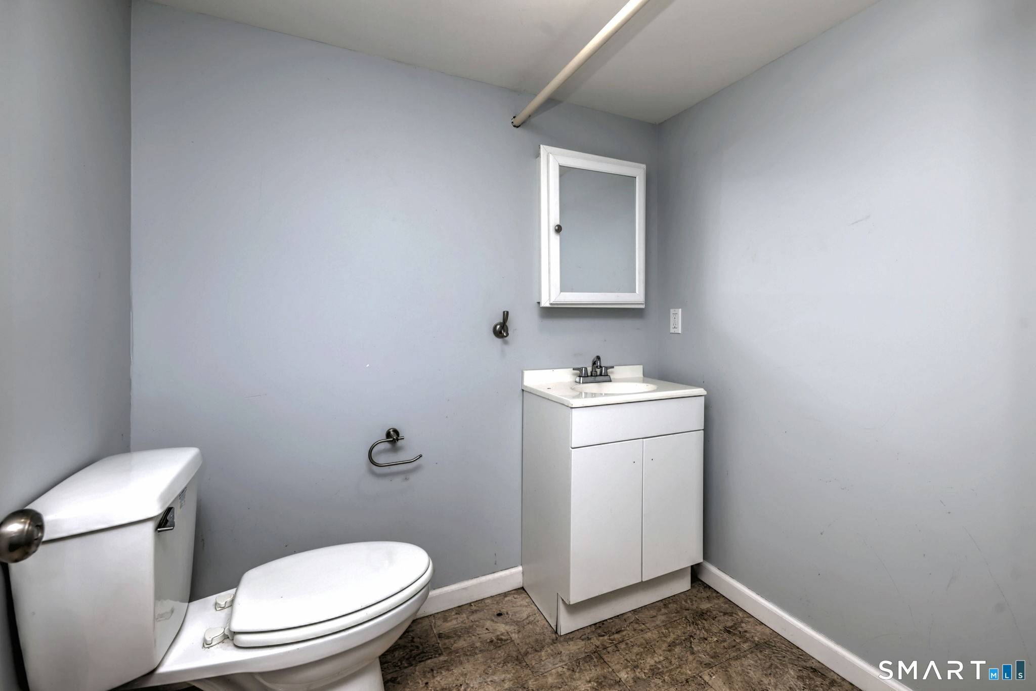 4 Fairview Road Woodbridge, CT 06525 - Photo 32 of 37 The half bathroom is in the basement.