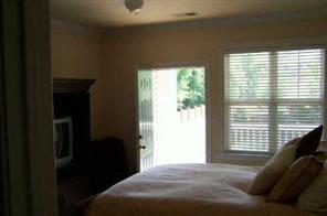 5601 Fairview Road, Unit 17 Charlotte, NC 28209 - Photo 6 of 7 a bedroom with a bed and a window
