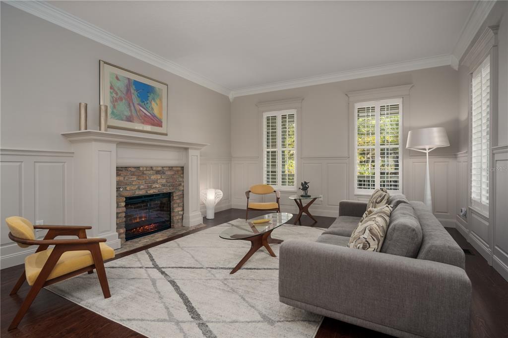 7 Bulow's Landing Flagler Beach, FL 32136 - Photo 15 of 92 a living room with furniture and a fireplace