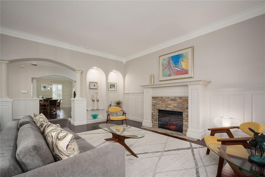 7 Bulow's Landing Flagler Beach, FL 32136 - Photo 17 of 92 a living room with furniture and a fireplace