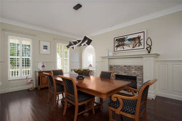 a kitchen with stainless steel appliances granite countertop a sink and a refrigerator