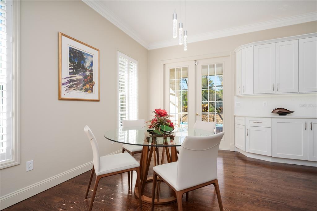 7 Bulow's Landing Flagler Beach, FL 32136 - Photo 27 of 92 a view of a dining room with furniture window and wooden floor