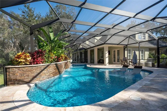 a bathroom with a shower and a sink