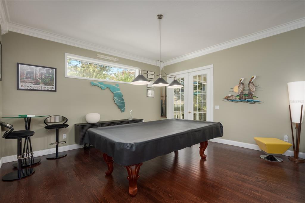 7 Bulow's Landing Flagler Beach, FL 32136 - Photo 45 of 92 a view of a dining room with furniture window and wooden floor