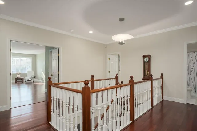 a front view of a house with a yard table and seating