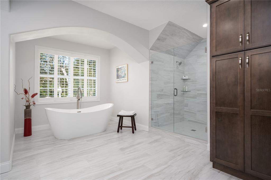7 Bulow's Landing Flagler Beach, FL 32136 - Photo 53 of 92 a bathroom with a bathtub and a shower