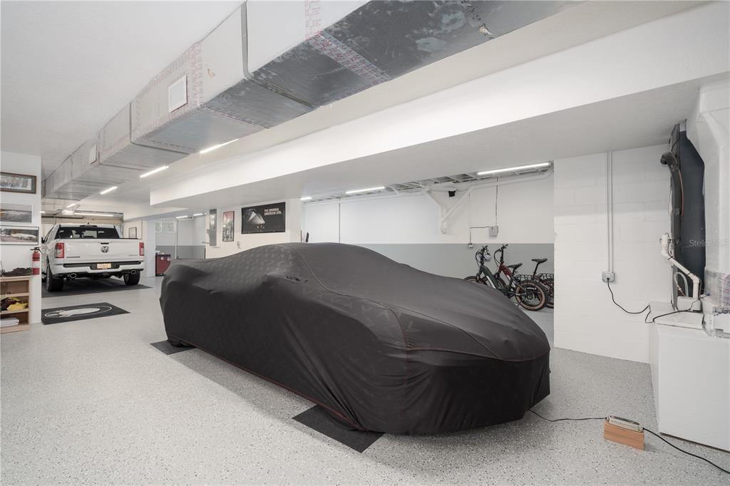 7 Bulow's Landing Flagler Beach, FL 32136 - Photo 75 of 92 a bedroom with a bed and a car parked