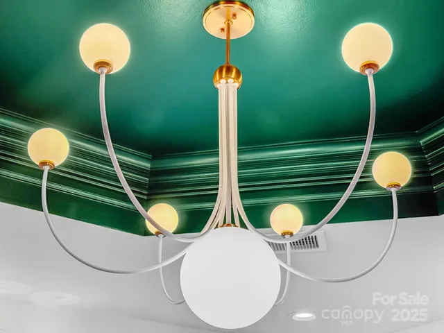 a bed room with furniture and a window