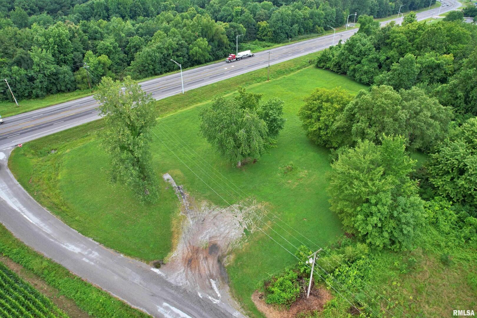 11 Faughn Lane Metropolis, IL 62960 - Photo 12 of 15 a view of a garden with a building in the background