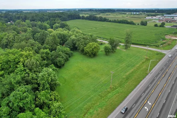 a view of a field with a garden