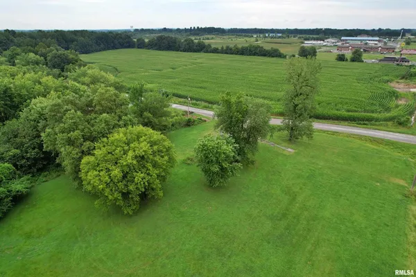 a view of a lake with a yard