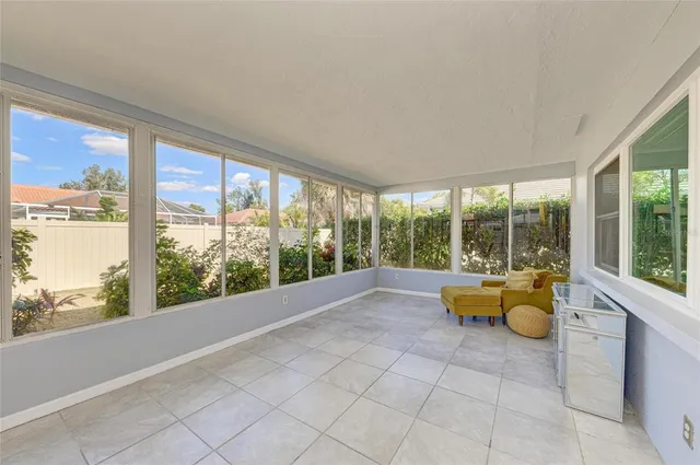 a view of a room with window and pool table