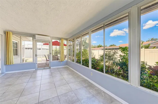 a view of an empty room with a large window