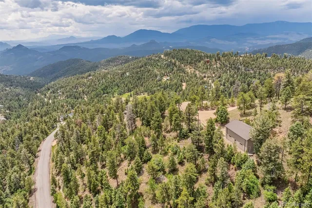a view of a city with mountain