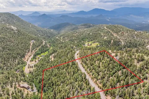 a view of city and mountain