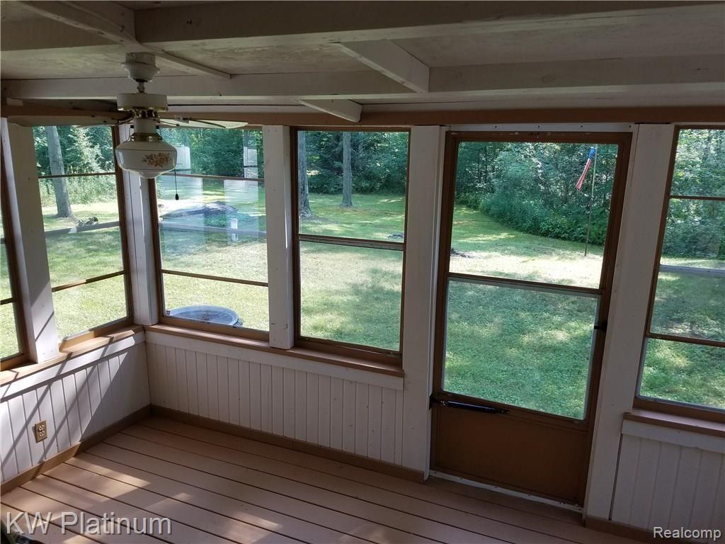 6244 Rynn Road North Street, MI 48049 - Photo 12 of 22 ENJOY THE SERENITY FROM THE FLORIDA ROOM